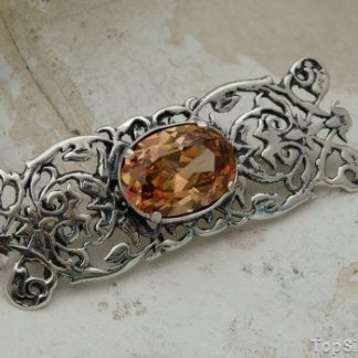 ATENEA - srebrna broszka z topazem złocistym