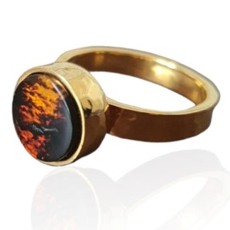 Pierścionek srebrny pozłacany z bursztynem  na czarnym dębie