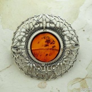 COMO - srebrna ażurowa broszka z bursztynem