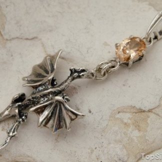 DRAGON  - srebrny smok z topazem złocistym