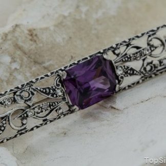 MADAGASKAR - srebrna broszka z ametystem i cyrkoni