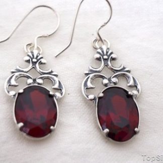 SAVINI - srebrne kolczyki z granatem