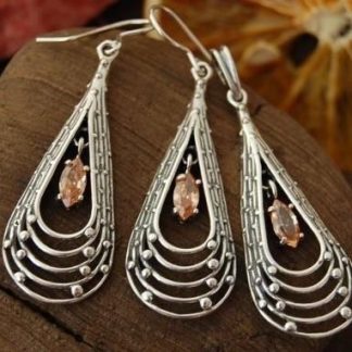 FALCO - srebrny z topazem złocistym