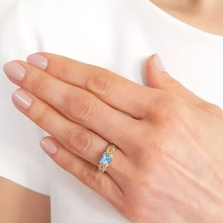 Pierścionek z żółtego złota z topazem Swarovski Ice Blue i diamentami AP-52Z-R