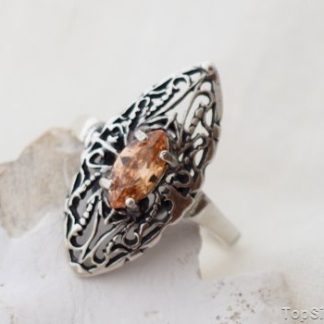 ONDA - srebrny pierścionek z topazem złocistym