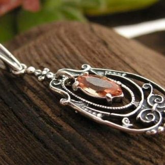 ORDESA - srebrny wisiorek z topazem złocistym