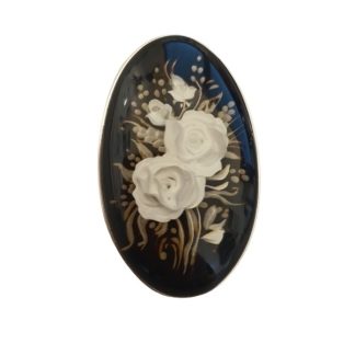 Broszko wisior z ręcznie rzeźbionym bursztynem w srebrze