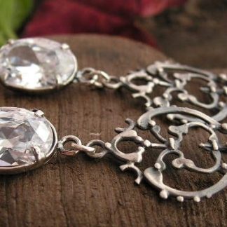 RIVOIRI - srebrne kolczyki z kryształem Swarovskiego