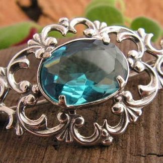 NEMI - srebrna broszka z akwamarynem