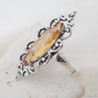 CHARO - srebrny pierścionek z topazem złocistym