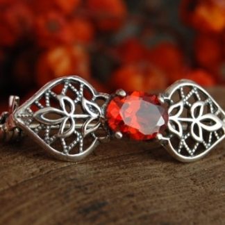 FRANSA - srebrna broszka z granatem