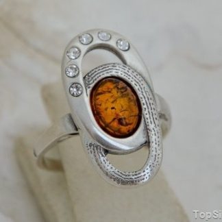 JUNAYA - srebrny pierścionek z bursztynem i kryształkami